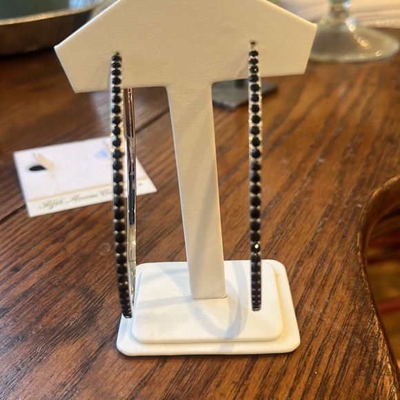 Large rhodium hoops with striking black Swarovski crystals. - Picture 3 of 7